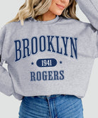 Park Chic Apparel, LLC | Brooklyn Rogers Sweatshirt - Adult Sweatshirt